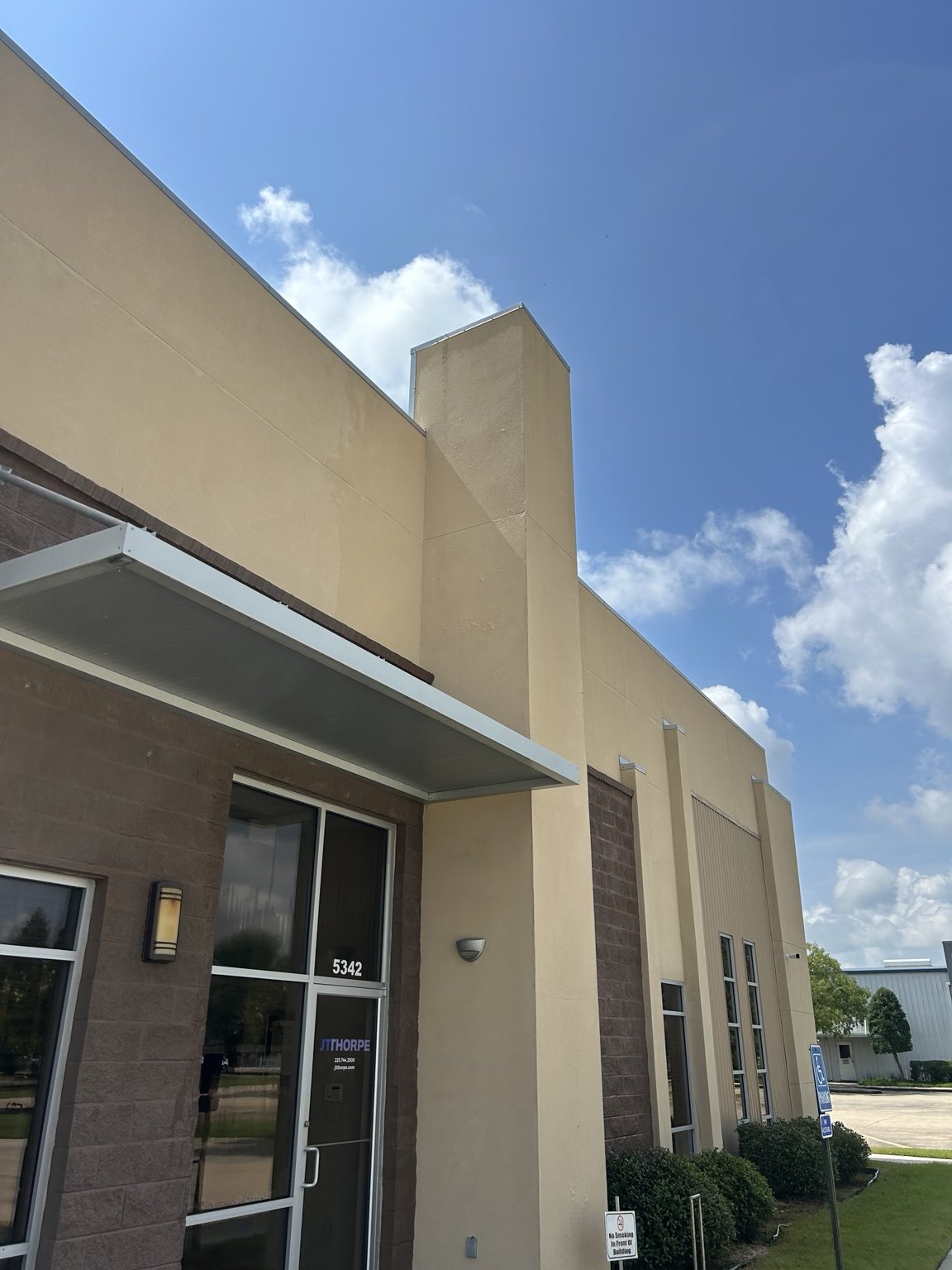 Clean commercial building exterior after washing