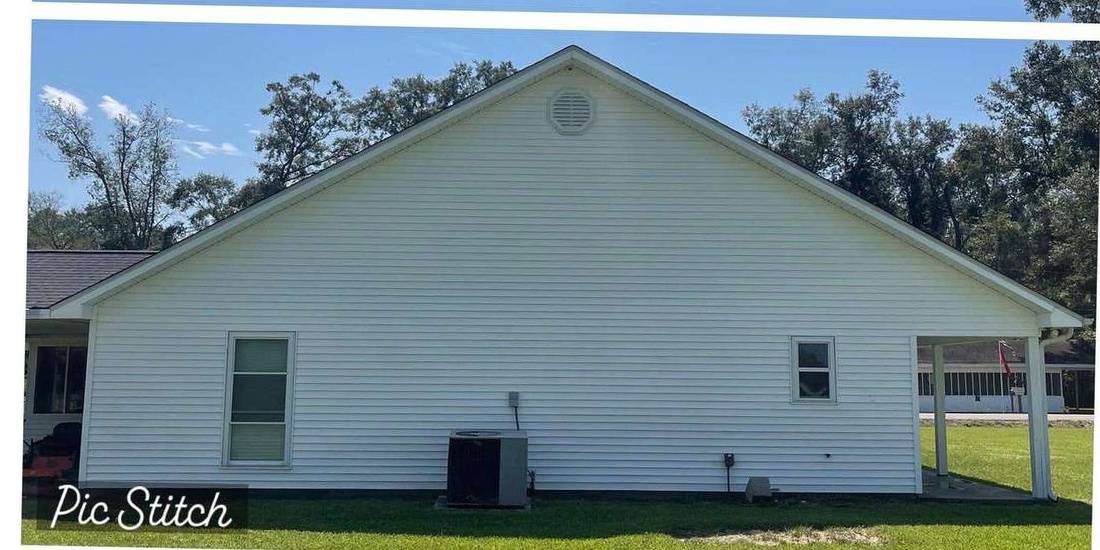 Clean white siding after soft washing